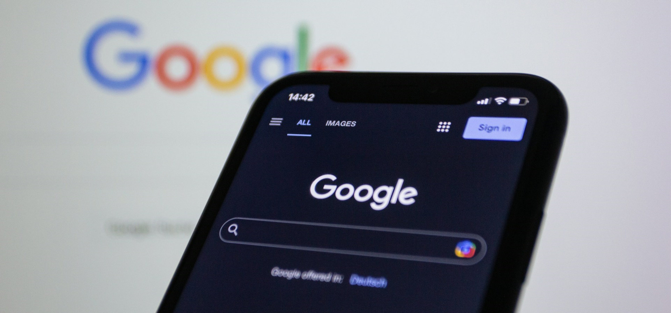 Google on a big screen and a mobile phone